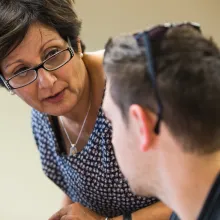 Professor talking to a student